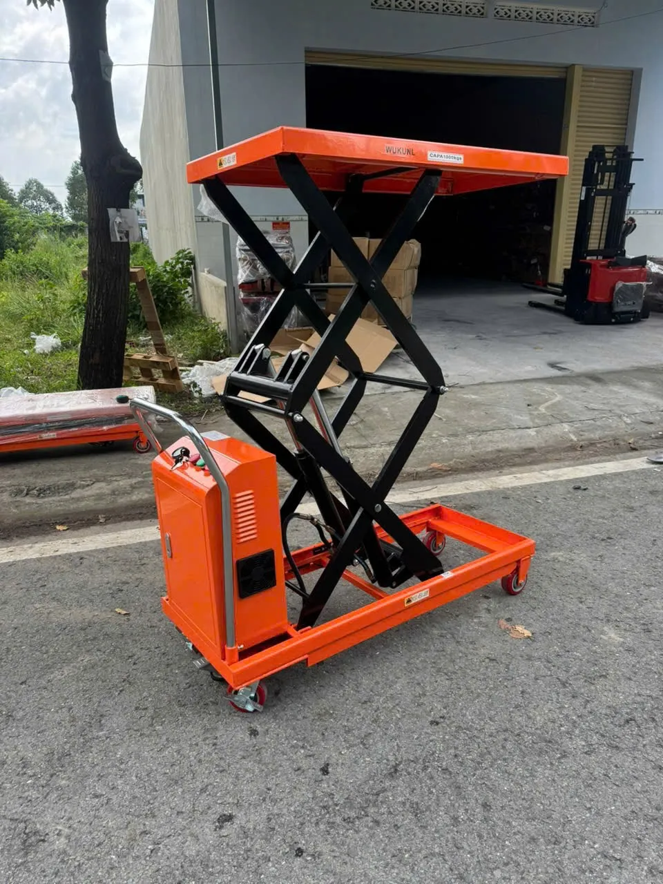 Xe nâng mặt bàn điện 1000kg 1m7 Wukunl